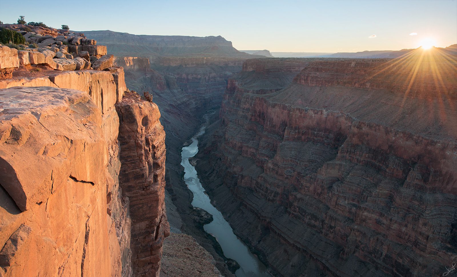 The Colorado River cutting through the Grand Canyon.